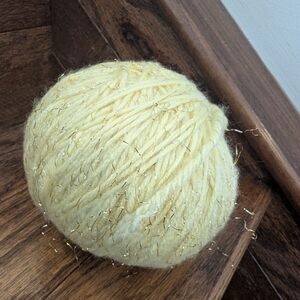 Yarn soft yellow with gold threads, 143 g. Vintage quality yarn